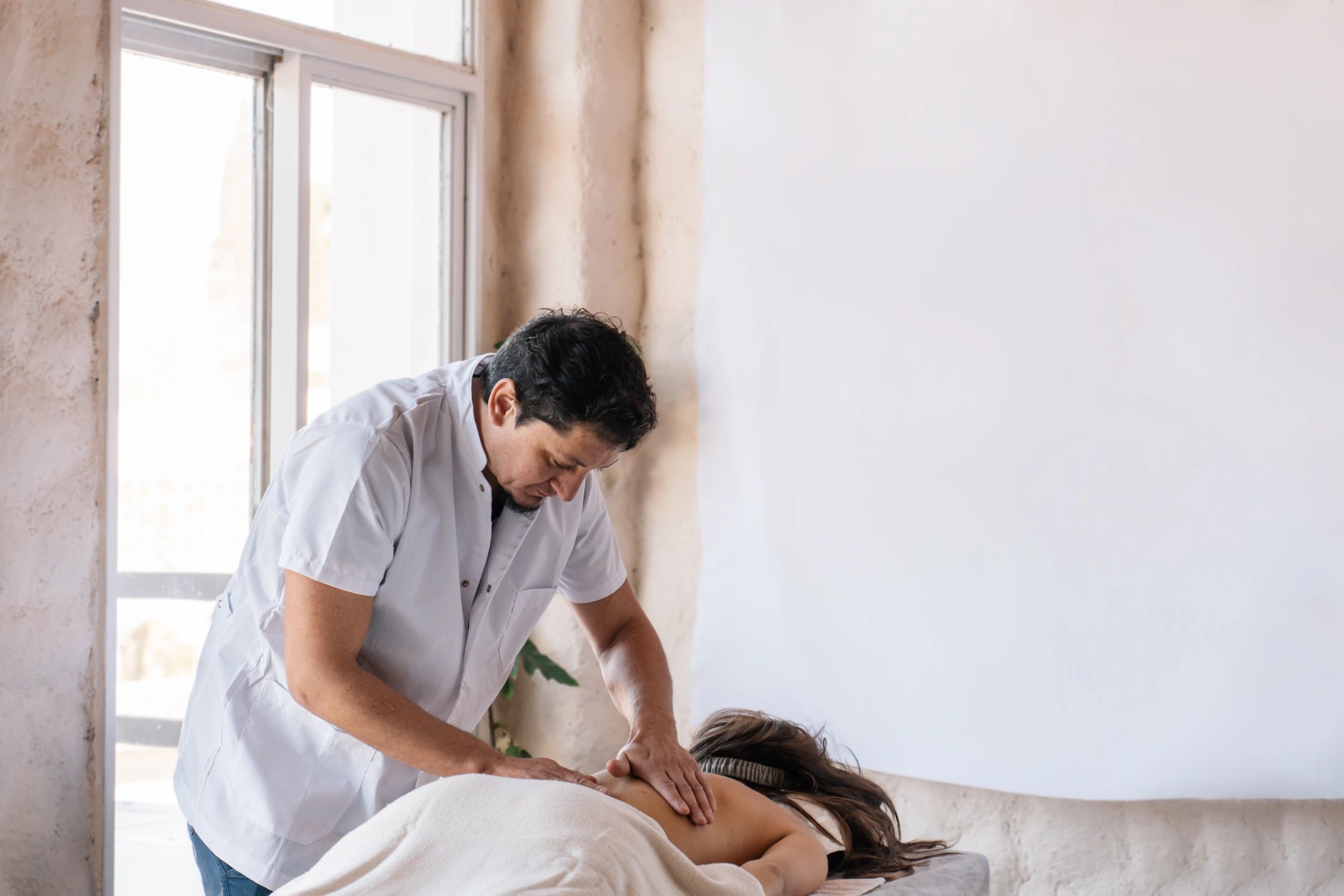 Clean, professional medical spa treatment room with neutral tones at The Spine Spa in Wilmington