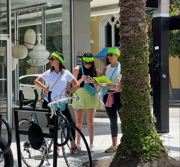 A scavenger hunt group searching around west palm beach