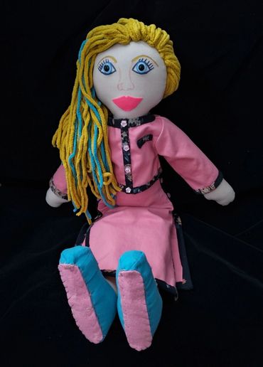 Blonde, blue eyed cloth doll