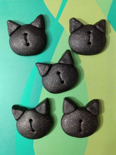 My handmade clay cat buttons for doll dresses.