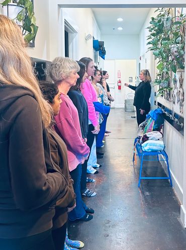 Instructor leading an in-person Breath Amigas breathing class