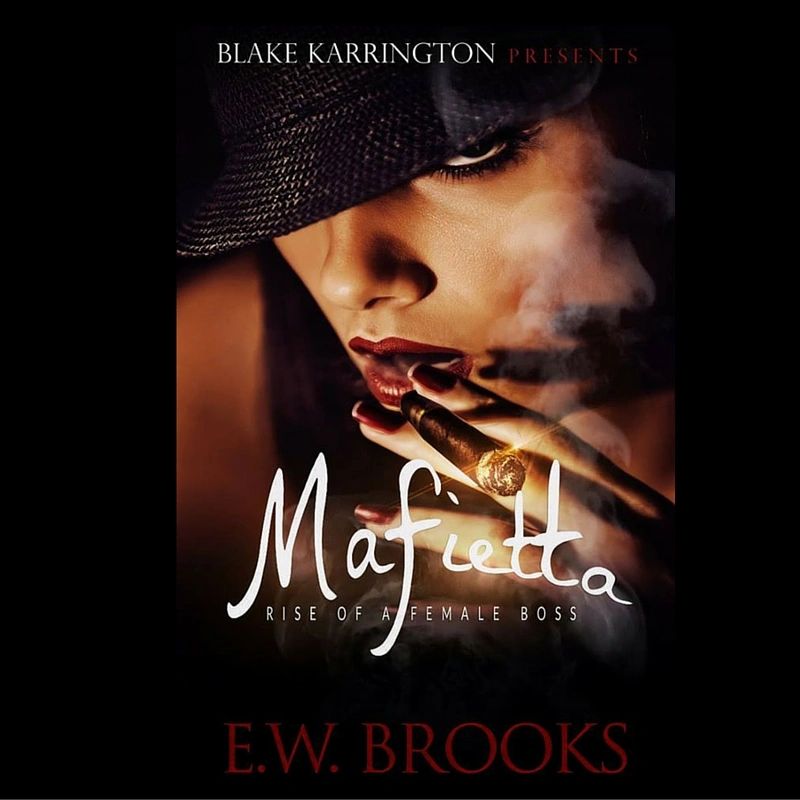 Mafietta smoking a cigar