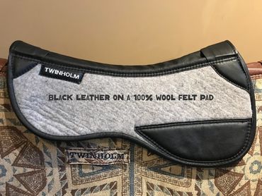 Black leather on a 100% wool felt pad