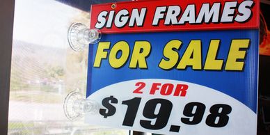 a sign that says sign frames for sale 2 for $ 19 98