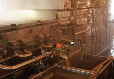 It is then drawn off the evaporator and run through the filter press.