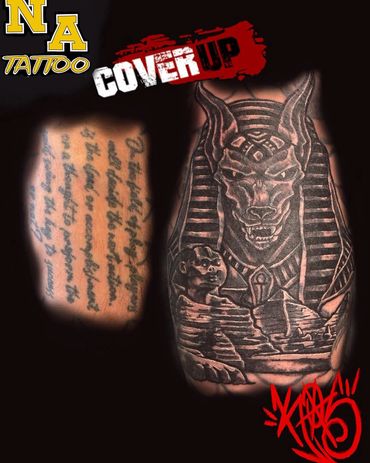Tattoo cover-up transformation from script to detailed Anubis design.