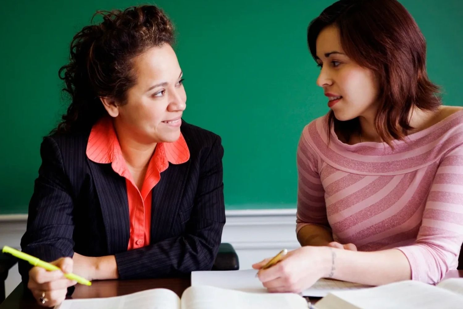 Two ladies collaborating. Mentorship.
