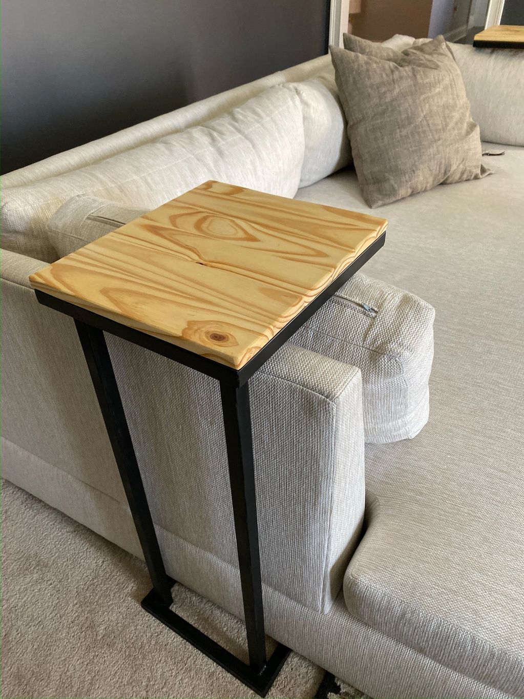 Custom C-shape end tables designed, welded, painted, and finished for a client.