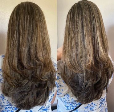 Before and after images of long, layered hair with subtle highlights.