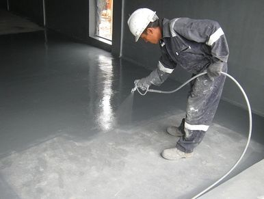 Rust Bullet (zero flame spread index) on concrete floor in explosive storage area.