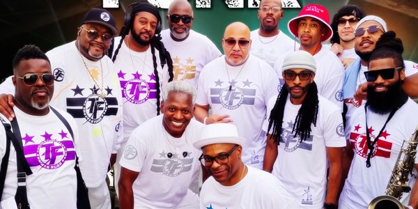 Group of men posing wearing matching white shirts.
