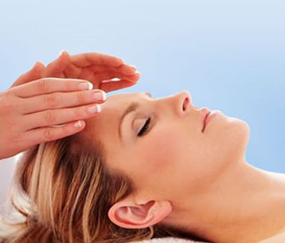 woman having a reiki energy healing session in Cary, NC