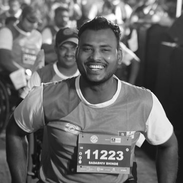 Happy PWD participant at Run InSync, capturing the spirit of unity and sport.