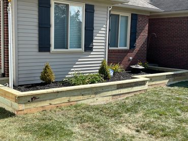 Custom wood Landscape beds and planter boxes