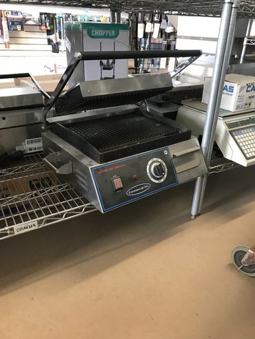Globe sandwich press, ribbed,220V. Overall 20"Wx18"D, cooking surface 15"Wx101/2"D-$350