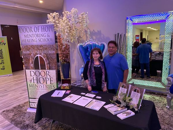 Two people at a book launching event