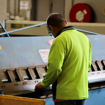 Staff member working in the ACOL warehouse