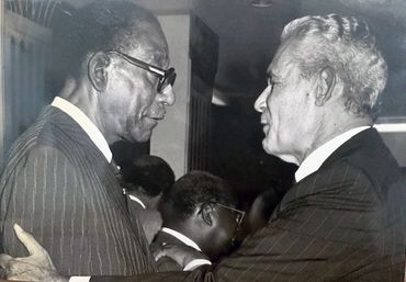Dr. Arthur Wint meets then Prime Minister Michael Manley during his time as High Commissioner in UK.