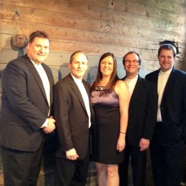 This picture doesn't do it justice, but we've played in large beautiful country barns, and fancy city apartments. We're good like that.