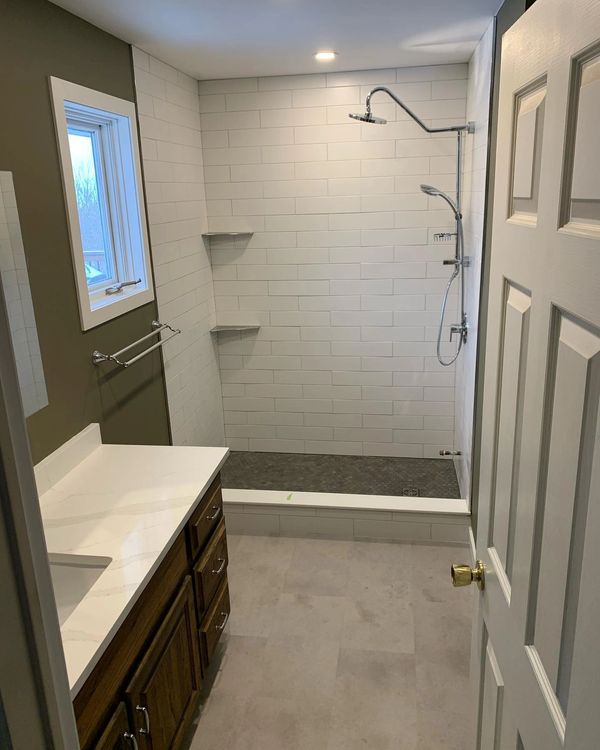 Bathroom Renovation in Barrie Ontario, framing, waterproofing, tile, paint, fixtures