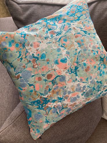 Scatter cushion made with hand marbled fabric