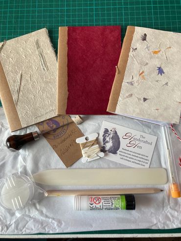 Easy to use bookbinding kit with pre-cut paper and tools included