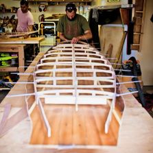 wooden surfboard workshop frame