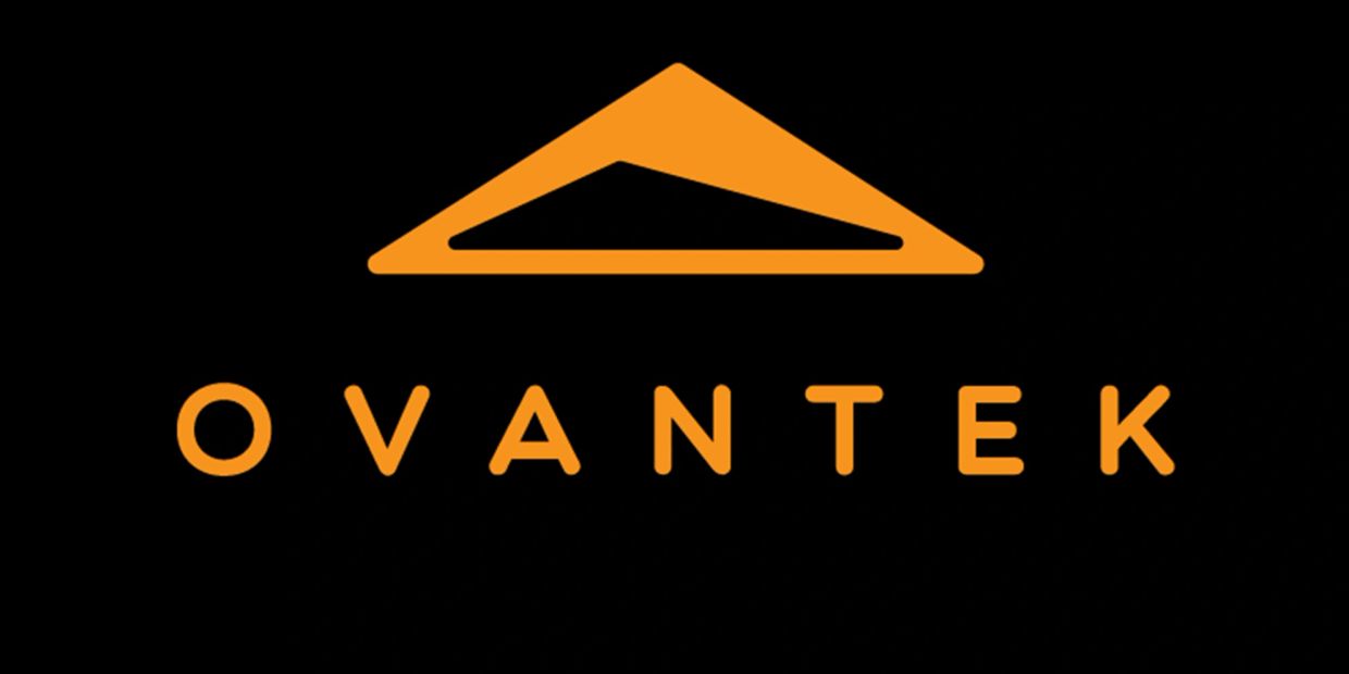 Orange OVANTEK logo with a triangular design on black background.