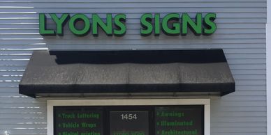Lyons Signs Inc. storefront on the Worcester/Millbury line