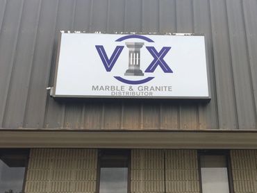 Illuminated box sign, Vix Marble, in industrial park, Shrewsbury, MA