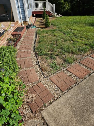 Before: customer requested brick edging for mulch bed.