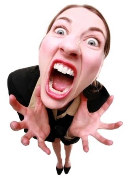 Woman appearing distressed screaming at camera