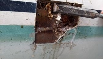 Wet balsa sandwich yacht hull saturated