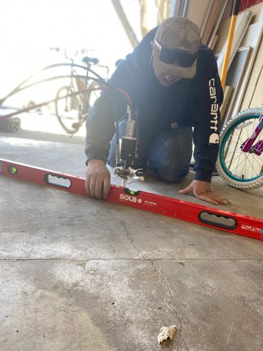 Lifting a garage floor in Olathe, KS