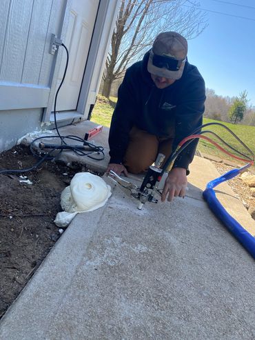 Leveling a concrete sidewalk in Olathe, KS
