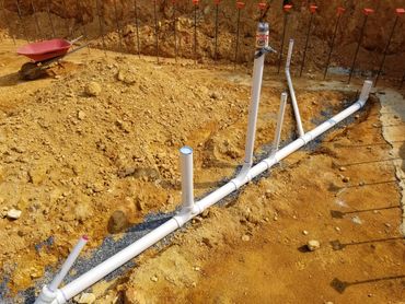 pipes installed in footer for foundation walls
