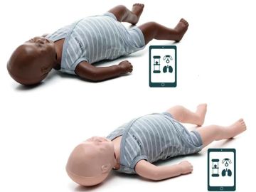 Two baby mannequins with a smartphone app showing medical icons beside them.