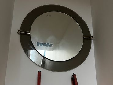 mounting a mirror on stairway