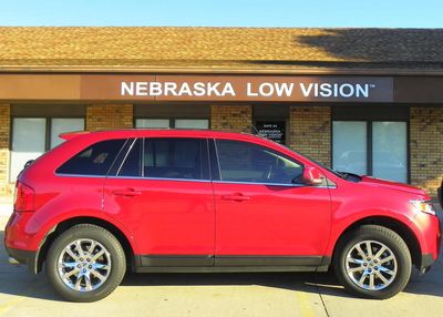 Picture of Red car in front of Nebraska Low Vision