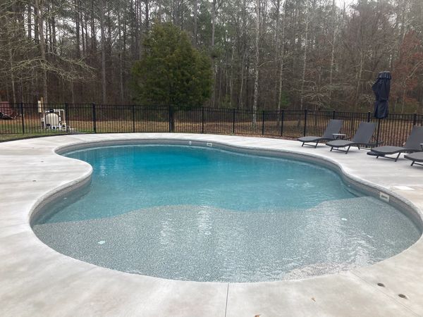 Tanning deck oasis style pool