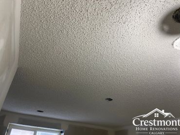 Newly textured popcorn ceiling in a home renovation project.