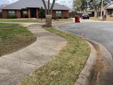New sod installed sidewalk