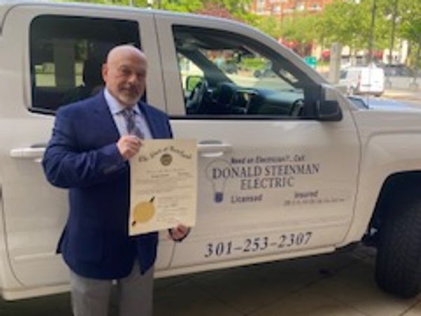 Don with his certificate of appointment to Maryland State Board of Electricians