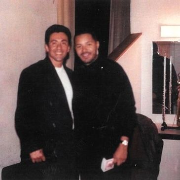 Two Men in Black Color Suits Portrait Image