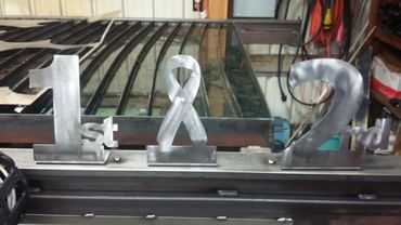 Simple trophies made from 14g steel.