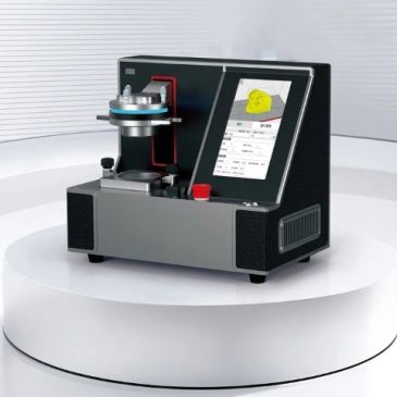 Compact 3D dental scanner on white pedestal.