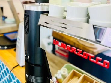 At Gilmartins Café, enjoy expertly brewed artisan coffee made with organic milk from Mossgiel Farm.