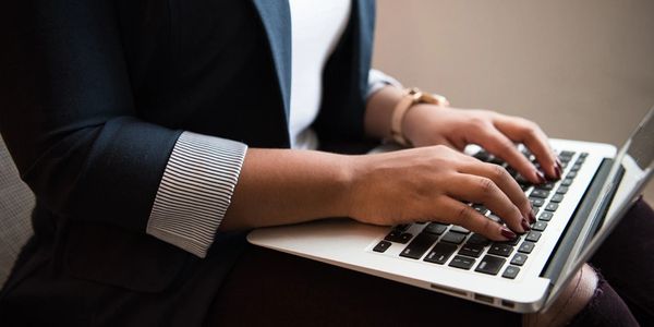 Black Women's Network registration materials for breakfast and networking breakfast forum