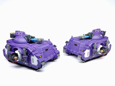 Example of completed Emperors children tanks painted Purple and white.