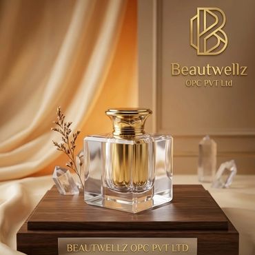 Elegant perfume bottle displayed on a wooden platform with a golden logo backdrop.